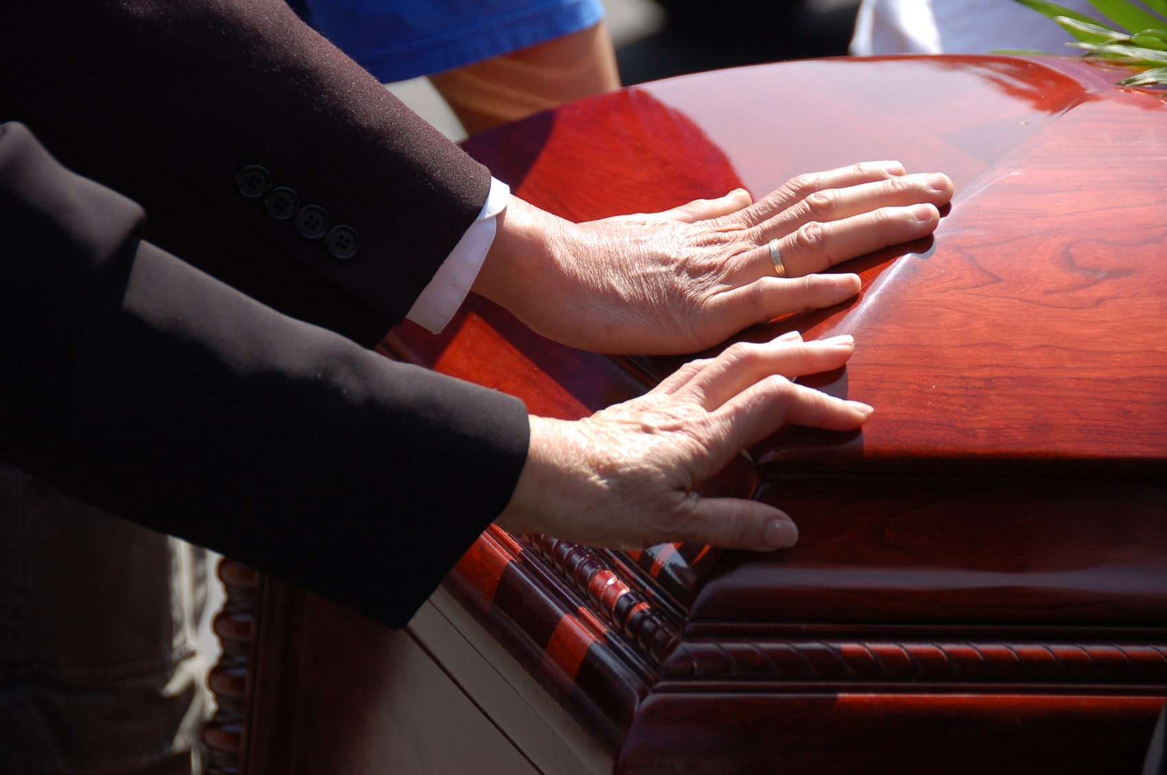 loved ones saying goodbye after the wrongful death of a family member