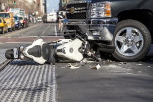 A woman talking to the police after a motorcycle accident in Austin, TX.