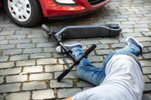 Man After Accident On Electric Scooter Overrun By Car