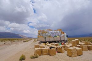 Lost truck load, the load spilled across the gravel road.